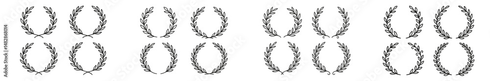 Wreaths arranged in symmetrical patterns on a plain background showcasing intricate leaf designs Wreaths arranged in symmetrical patterns on a plain background showcasing intricate leaf designs