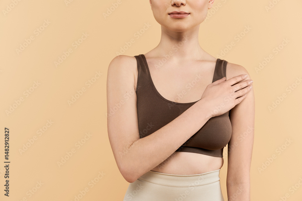 Obraz premium Embracing body positivity with confidence and grace in a soft, warm palette