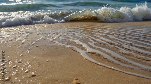 Wallpaper Mural Close-up of Gentle Translucent Wave Washing Over Wet Sand on a Sunny Beach - 2 Torontodigital.ca