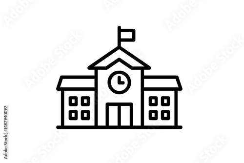Historic school building with clock tower and flag waving under a clear blue sky