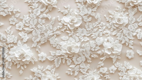 Closeup view of delicate floral lace fabric.