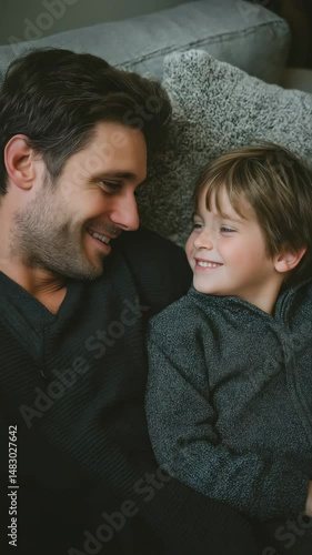 Father and son sharing a smile.