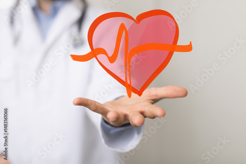 Image of a doctor's hand ho...