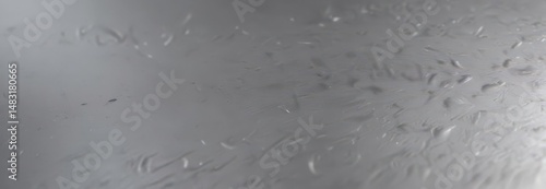 Reflective silver, subtly scratched, smooth, shiny metallic surface, light, design, premium