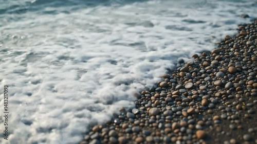 Wallpaper Mural Sea Foam Washes Over Smooth Beach Pebbles Torontodigital.ca