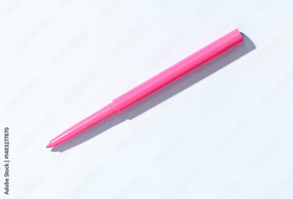 One twist up eye pencil on white background, top view One twist up eye pencil on white background, top view