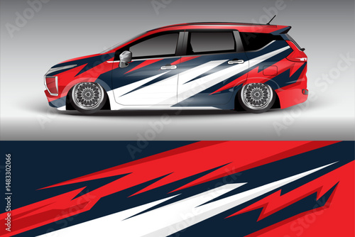 Stylishly Wrapped Car with Dynamic Graphics in Urban Setting