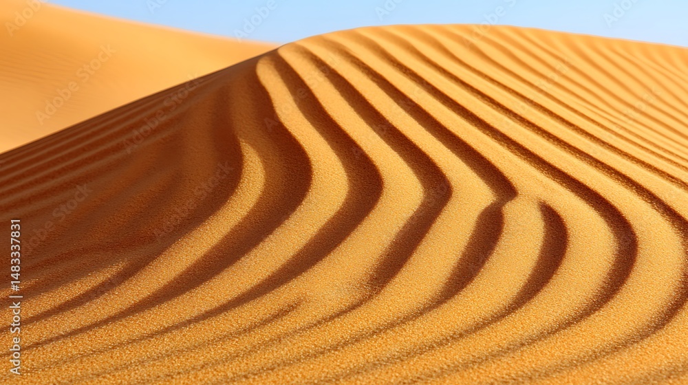 Naklejka premium Golden ripples dance across the sandy dunes in a mesmerizing desert landscape