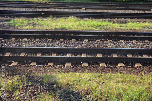 Railway Tracks in Green Landscape for Transportation and Travel Concepts