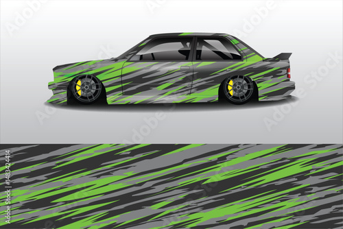 Sleek modified car with vibrant green graphics design