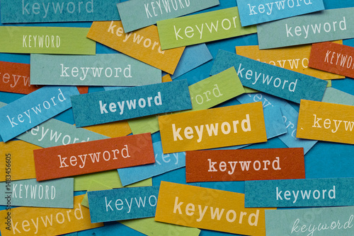 Papier peint keyword research concept, many keywords on colorful papers