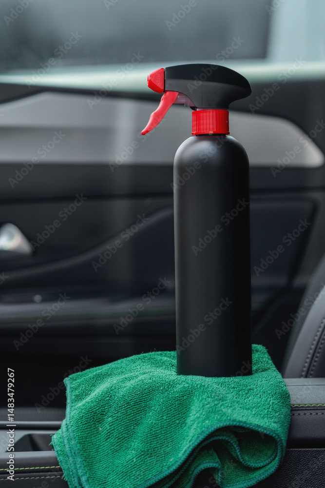 Naklejka premium Car interior with cleaning supplies and microfiber cloth
