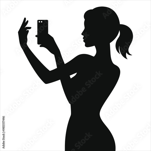 Stylish Woman Taking a Selfie Vector Silhouette/A sleek silhouette of a woman taking a selfie with a smartphone.