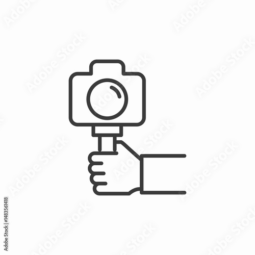 camera hand holding icon sign vector
