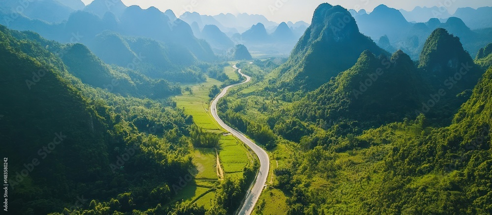 Serene landscape of winding road through green hills and verdant forests Serene landscape of winding road through green hills and verdant forests