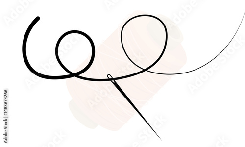 Needle with black thread on the background of a ball of thread