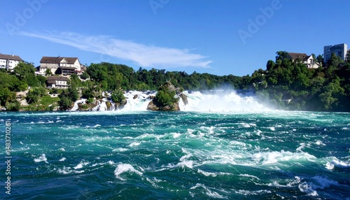 stunning daytime view of the rushing waters at rhine falls switzerland