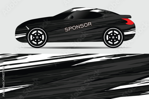 Sleek black sports car with dynamic design on display