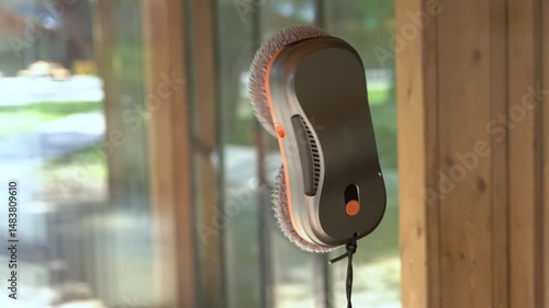 Robot window cleaner working on glass surface