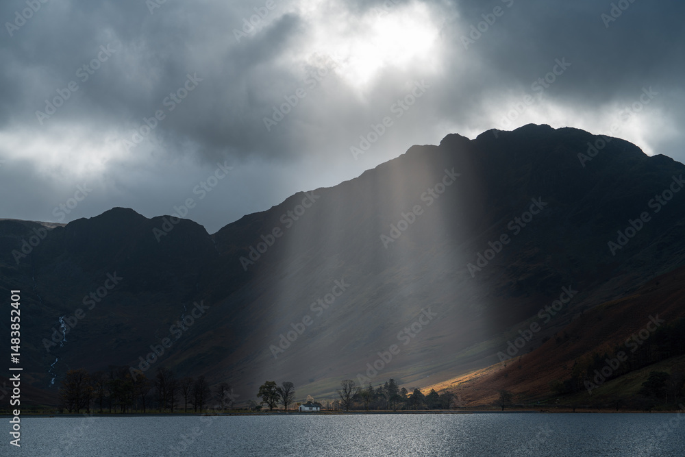 Buttermere lake and Haystacks with sunbeams in Lake District. England
