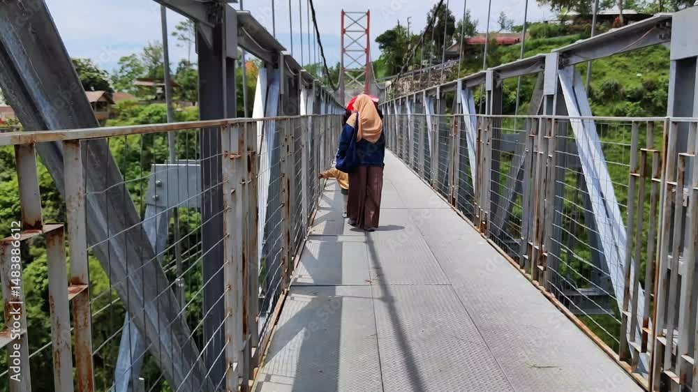 custom made wallpaper toronto digitalA mother and son walk together on a suspension bridge