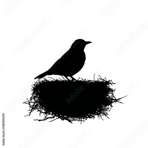 Solid black silhouette of a bird nesting