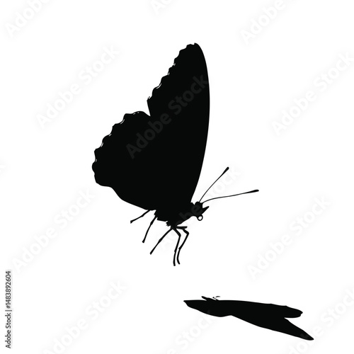 Solid black silhouette of a butterfly flying