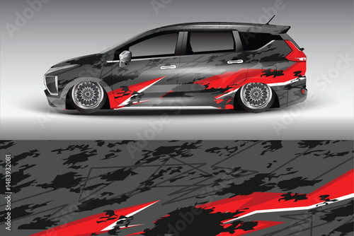 Stylish modified car with unique paint design on display