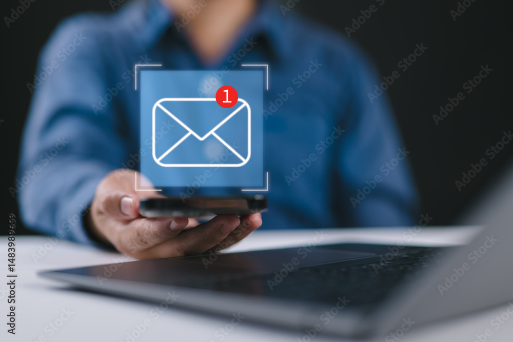 Businessman using email marketing tools on laptop and smartphone, sending newsletters and analyzing campaign performance to engage subscribers and grow business through personalized content Businessman using email marketing tools on laptop and smartphone, sending newsletters and analyzing campaign performance to engage subscribers and grow business through personalized content