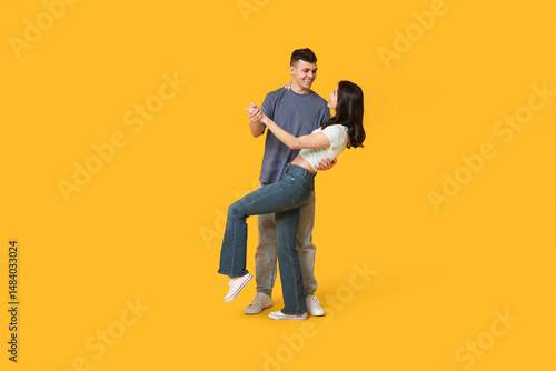 Beautiful young couple danc...