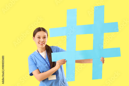 Young asian female doctor h...