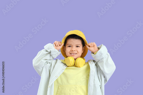 Cute little Asian boy in ad...