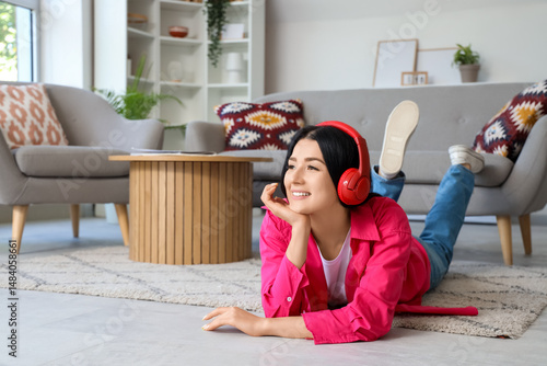 Young woman in headphones l...