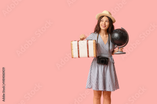 Young Asian woman with glob...