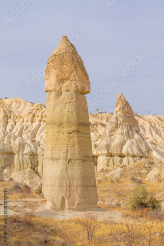 Cappadocia rock formation sites and chimneys. Kapadokya in Turkey, Love Valley. Tuff volcanic rock pillars and mushrooms in the museum under open sky in Cappadocia turkish famous tourist sight