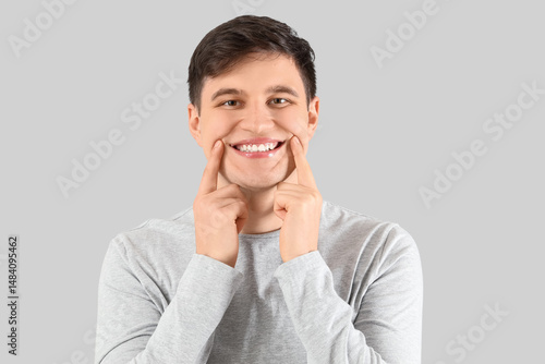 Smiling young man with heal...
