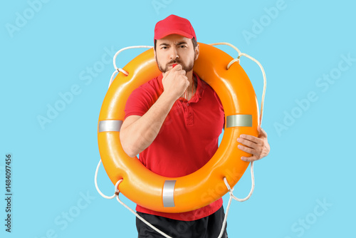 Beach rescuer with lifebuoy...
