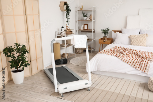 Interior of light bedroom w...