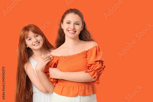 Young ginger woman and her ...