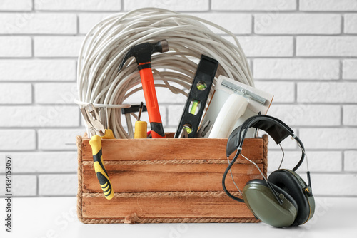 Box with protective headset...