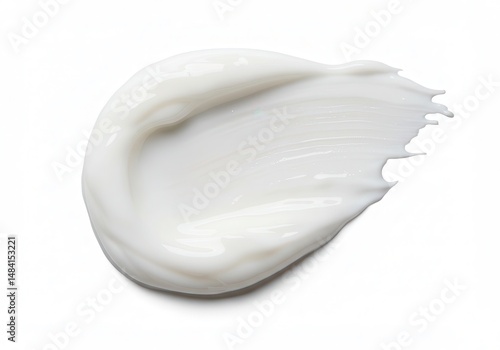White cream smear on a white background, ideal for beauty and skincare concepts