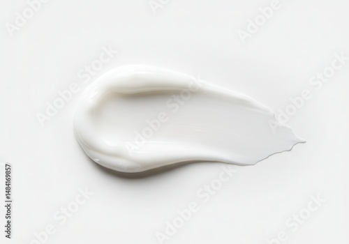 White cream smear on bright background, cosmetic product sample