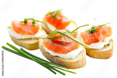 Elegant salmon canapés on toasted baguette slices, garnished with chives