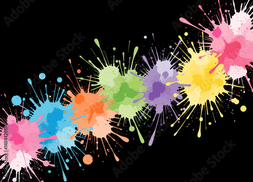 Colorful Splashes on Black Background with Bright Hues and Dots