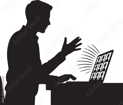Silhouette Of Man Engaged In Video Conference Call On Laptop Computer.