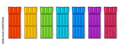 Vibrant inflatable mats in variety colors including orange yellow green blue purple red arranged in row against white background. Perfect for summer pool parties and beach fun. Bright design