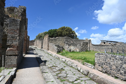 Fototapeta Naklejka Na Ścianę i Meble -  Historic streets of Ancient  roman city of Pompeii Italy on the shadow of Mt Vesuvius.Roman world, UNESCO World Heritage Site, Pompeii Archaeological Park. Italy