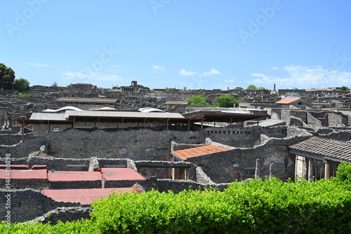 Fototapeta Naklejka Na Ścianę i Meble -  Historic streets of Ancient  roman city of Pompeii Italy on the shadow of Mt Vesuvius.Roman world, UNESCO World Heritage Site, Pompeii Archaeological Park. Italy