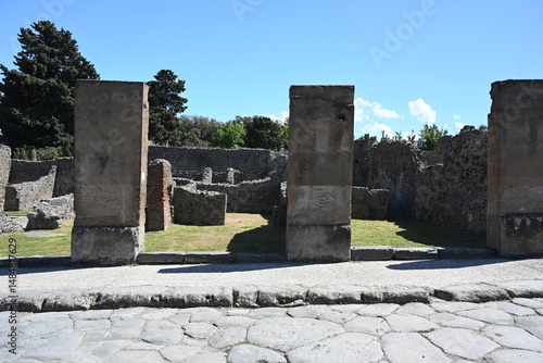 Fototapeta Naklejka Na Ścianę i Meble -  Historic streets of Ancient  roman city of Pompeii Italy on the shadow of Mt Vesuvius.Roman world, UNESCO World Heritage Site, Pompeii Archaeological Park. Italy