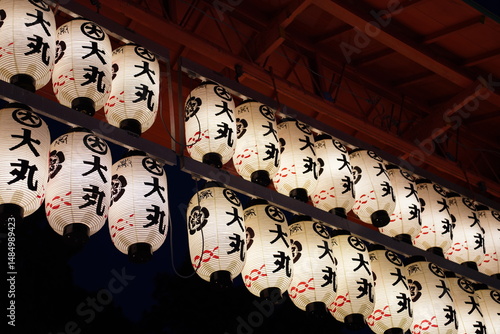 photo of lighting Japanese paper lantern in a old traditional temple, Yasaka Jinja in kyoto japan